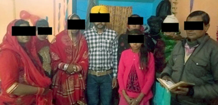 Picture of a Sikh family who have become believers.