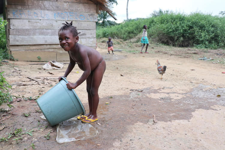 Picture of girl in Malapi bathing in water