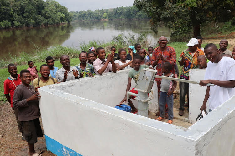 Picture of Malapians gathered around their well