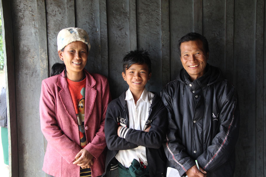 Picture of boy with his family