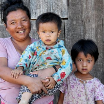 woman-child Mother with her two children after reunification process