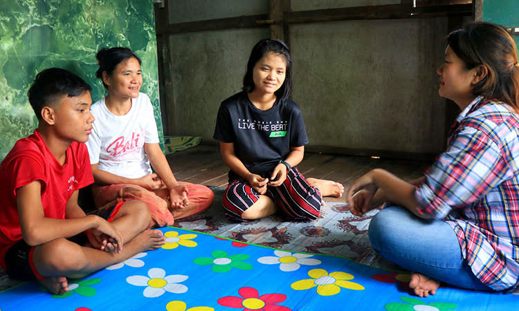 Picture of child reunified with family in Myanmar