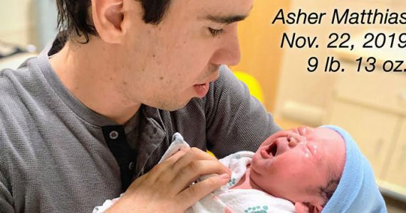 Picture of Orphan's Tear Ministry Director Stephen Servant with newborn son, Asher