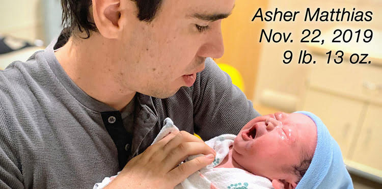 Picture of Orphan's Tear Ministry Director Stephen Servant with newborn son, Asher