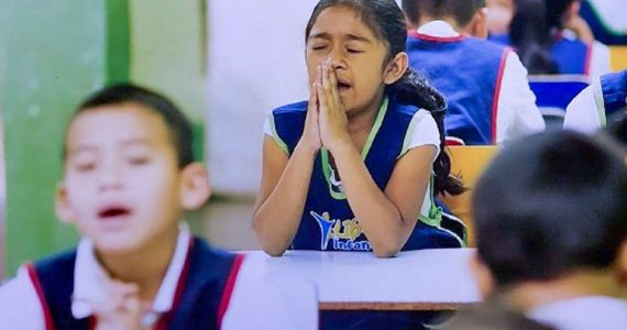 Picture of girl in Guatemalan classroom - Covid-19 pandemic