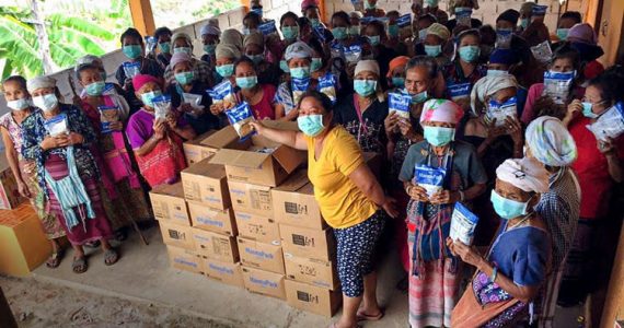 Picture of unreached people group receiving aid during covid