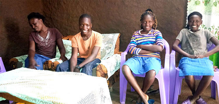Picture of Kenyan widow and her family in new house