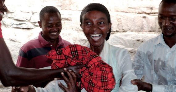 Picture of Kenyan widow being baptized