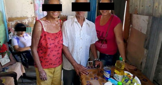 Picture of family receiving disaster relief