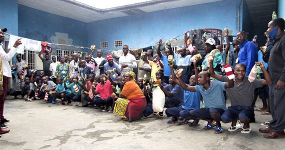 Picture of inmates receiving supplies