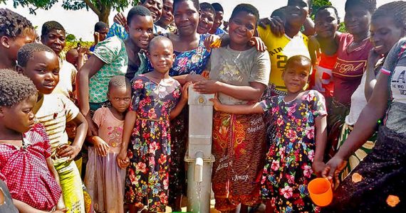 Image of villagers in Malawi with safe water