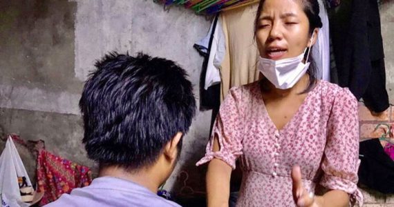Image of trafficking victim being prayed over