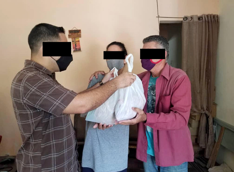 Image of couple receiving aid