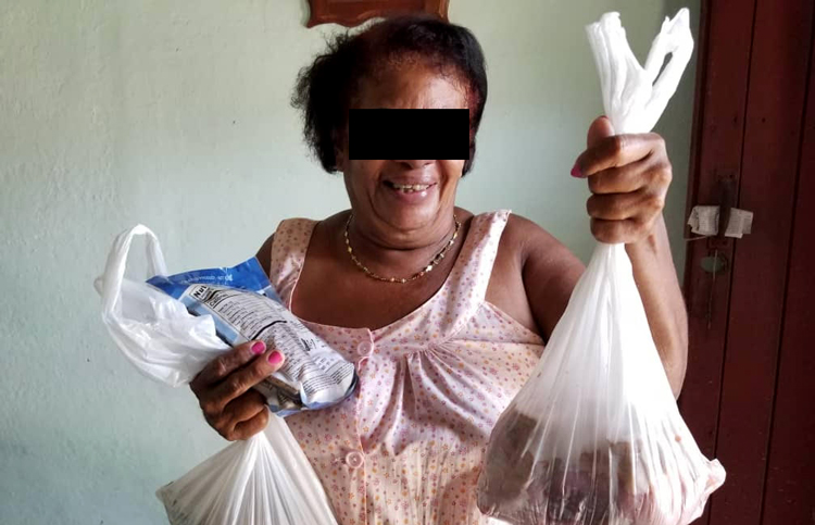Image of woman receiving aid