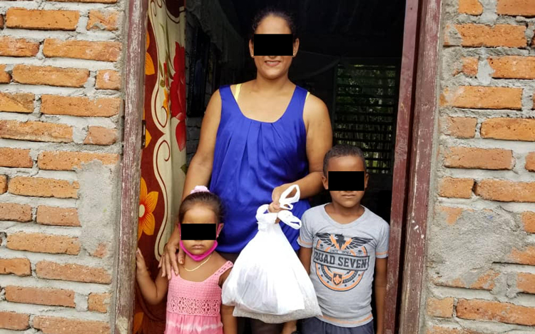 Image of family receiving aid
