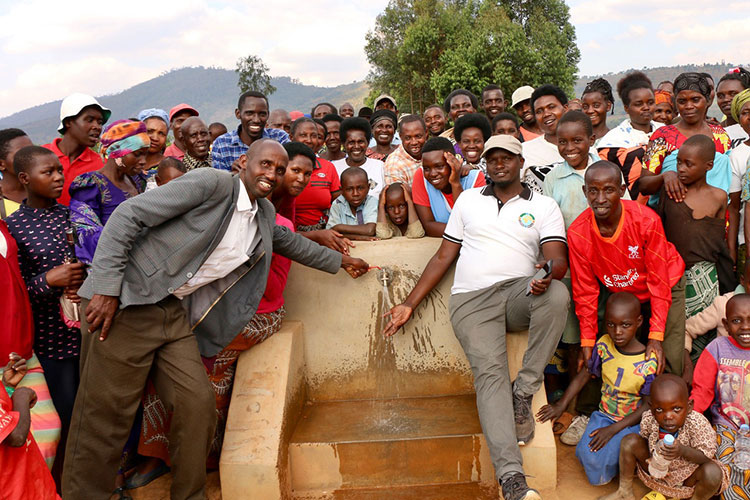 Image of Karama villagers with safe water