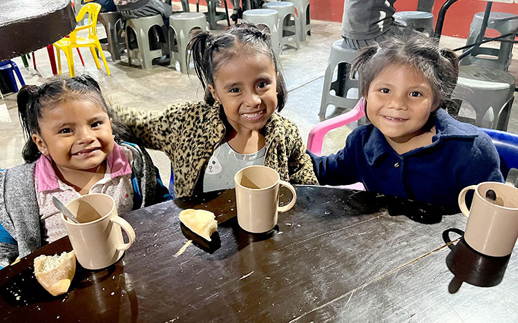 Image of Emily with friends after being rescued