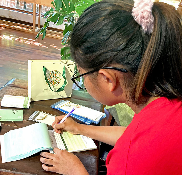 Image of rescued girl working