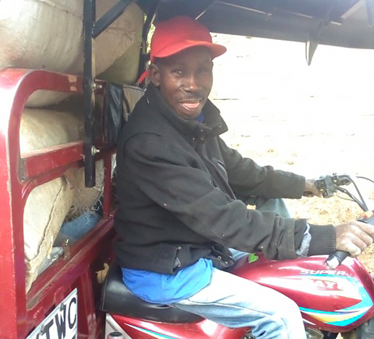 Image of borrower with Tuk-Tuk