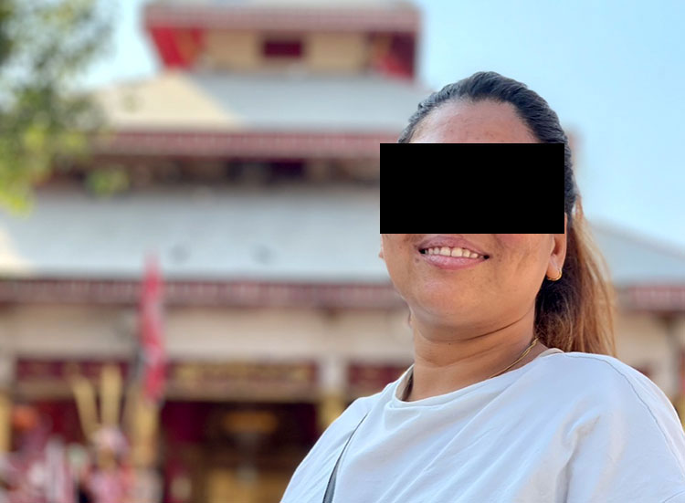 Image of missionary in front of Hindu temple