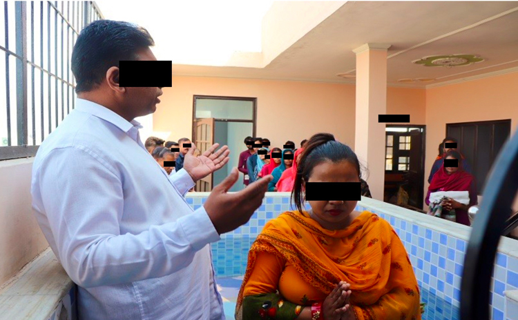 Image of secret baptism on rooftop
