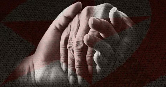 North Korean Christians holding hands