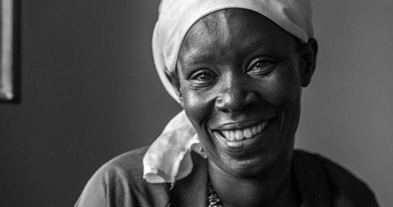 picture of Rebecca of Rwanda smiling, teary-eyed