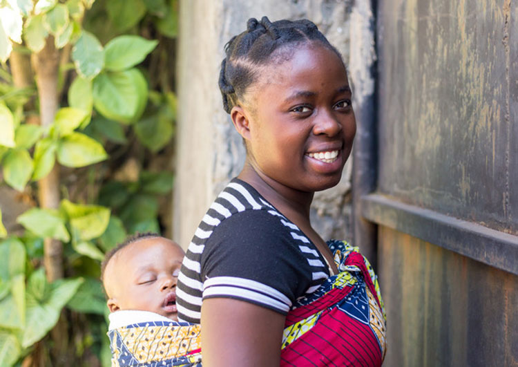 Woman in Africa with child