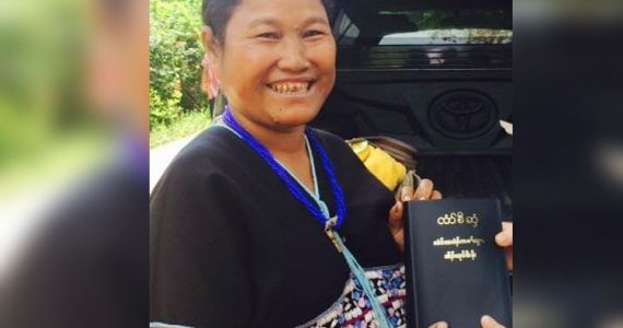 Woman with gift of Bible