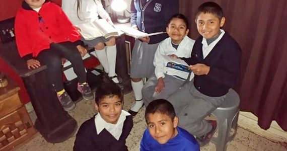 Picture of children in Mexico with electricity working