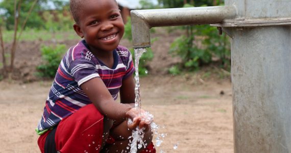 Picture of little girl drinking clean water