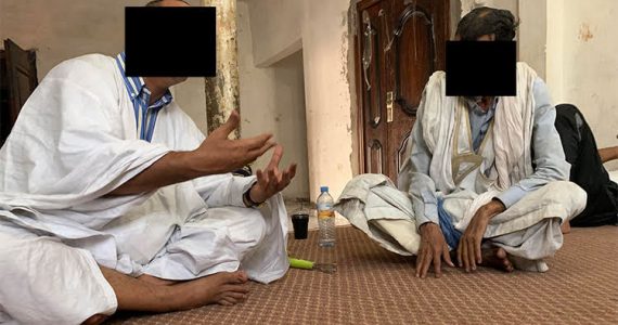 Picture of micro-banker and borrower