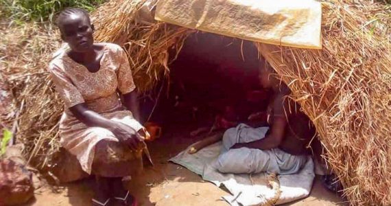 Picture of widow in makeshift hut in Uganda