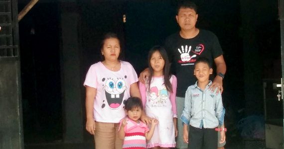 Picture of Putra and his family