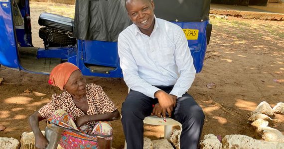 Image of leprosy victim receiving aid