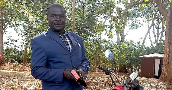 Image of evangelist with motorbike