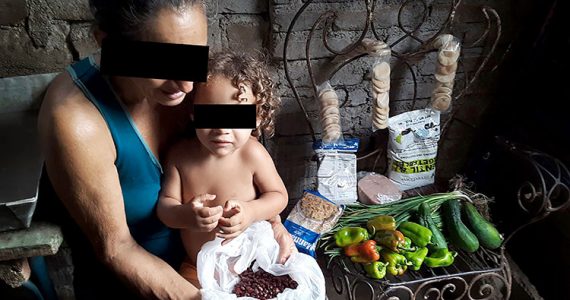 Image of family receiving food relief