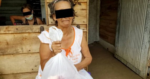 Image of woman receiving aid