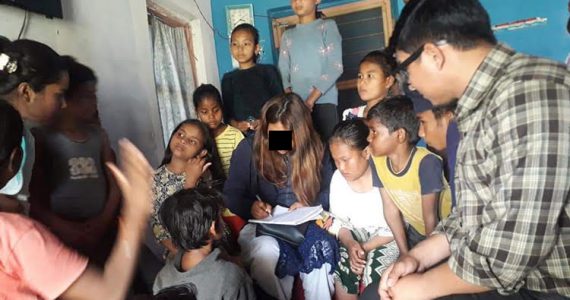 Image of missionary sharing the gospel with deaf students